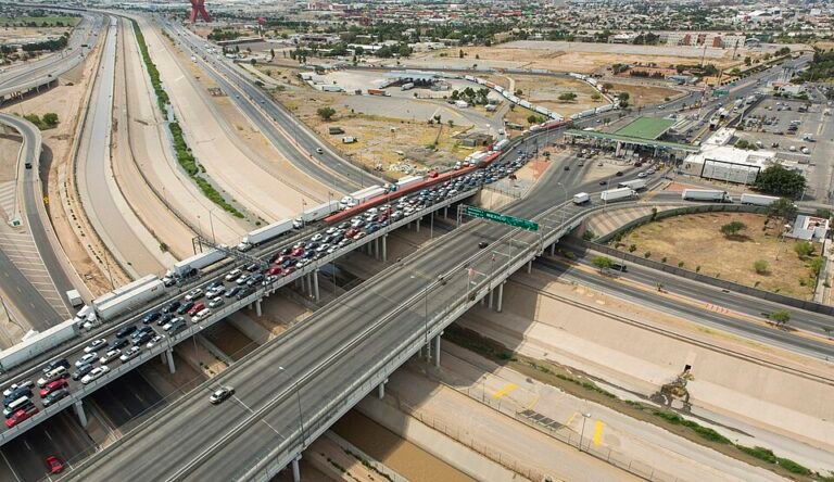 Aerial view of traffic lines and trucks on the Bridge of the Americas crossing between El Paso, Texas, and Ciudad Juárez, Mexico