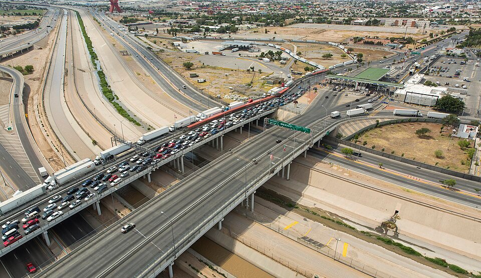 Aerial view of traffic lines and trucks on the Bridge of the Americas crossing between El Paso, Texas, and Ciudad Juárez, Mexico