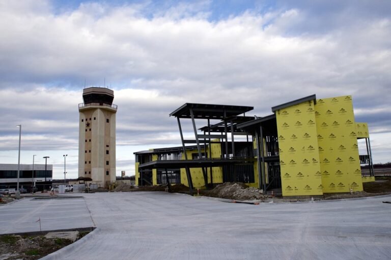 McKinney National Airport in McKinney, Texas, with its control tower and a new terminal under construction, January 2020