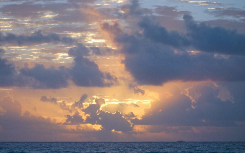 Sunrise over the Caribbean Sea from a Playa del Carmen beach