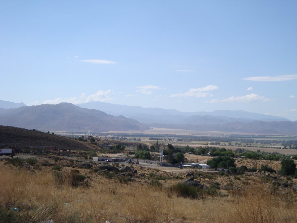 Panoramic view of the Valle de la Trinidad farming valley and surrounding mountains in Ensenada, Baja California