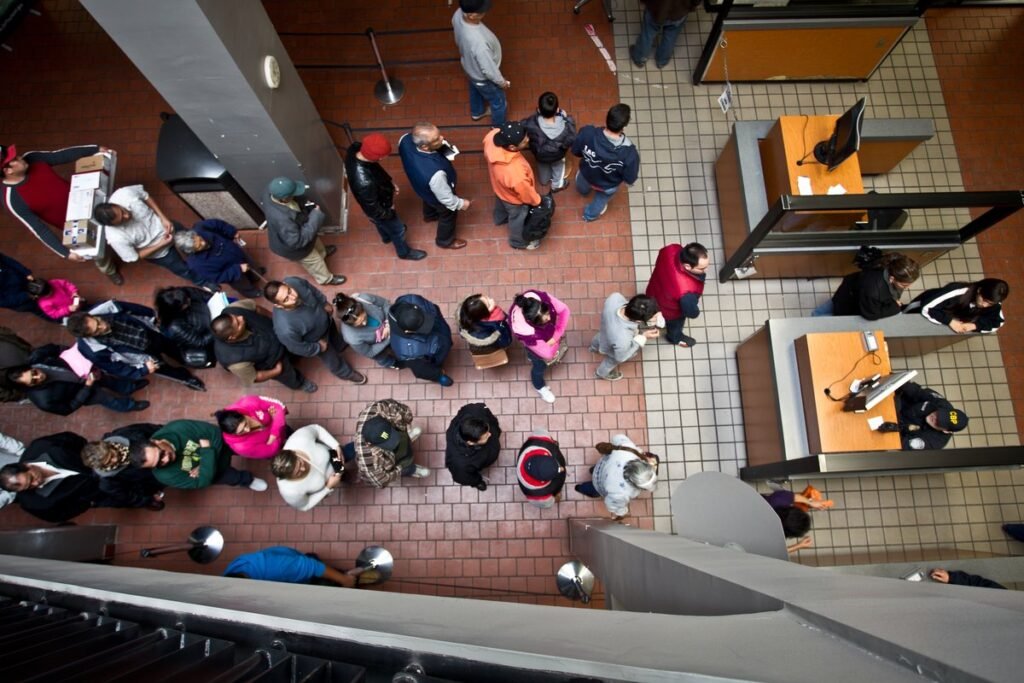 Pedestrians line up for CBP inspection booths at the Calexico port of entry, seen from above