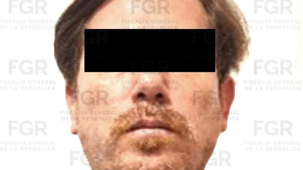 FGR identification photo of Jesús Antonio 'N', alias 'El Peli', with a black bar over his eyes and FGR watermarks.